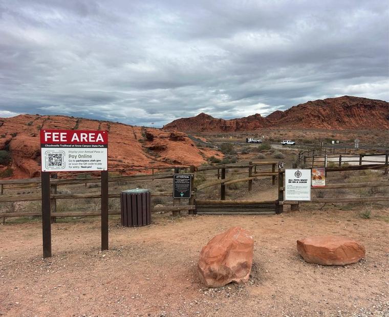 Fee area sign and gate at the Chuckwalla Trailhead